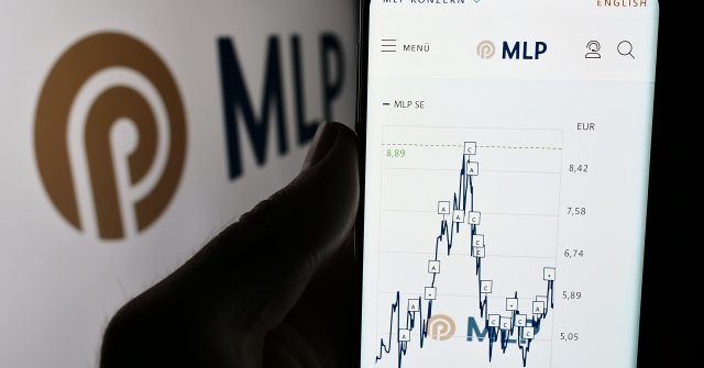 Stuttgart, Germany - 07-15-2024: Person holding mobile phone with website of German financial services company MLP SE in front of business logo. Focus on center of phone display.