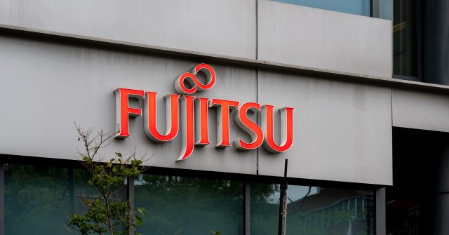 Montreal, QC, Canada - September 6, 2021: Close up of Fujitsu sign on their office building in Montreal, QC, Canada. Fujitsu is a Japanese information and communication technology company.