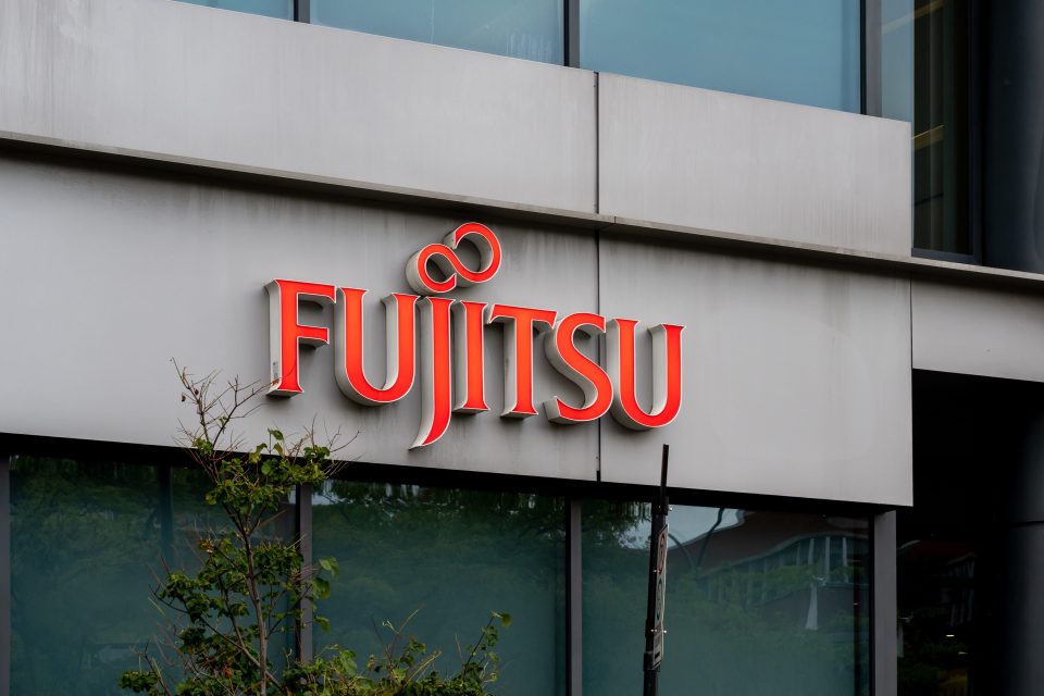 Montreal, QC, Canada - September 6, 2021: Close up of Fujitsu sign on their office building in Montreal, QC, Canada. Fujitsu is a Japanese information and communication technology company.