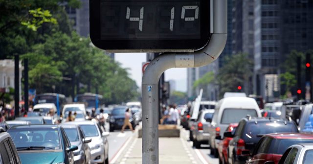 Street digital thermometer measures a temperature of 41 degrees celsius in Paulista avenue, Avenida Paulista, during a extreme heat wave in Sao Paulo, Brazil.