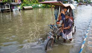 Die Auswirkungen des Klimawandels sind extrem. Hier: Eine Flut in Indien.